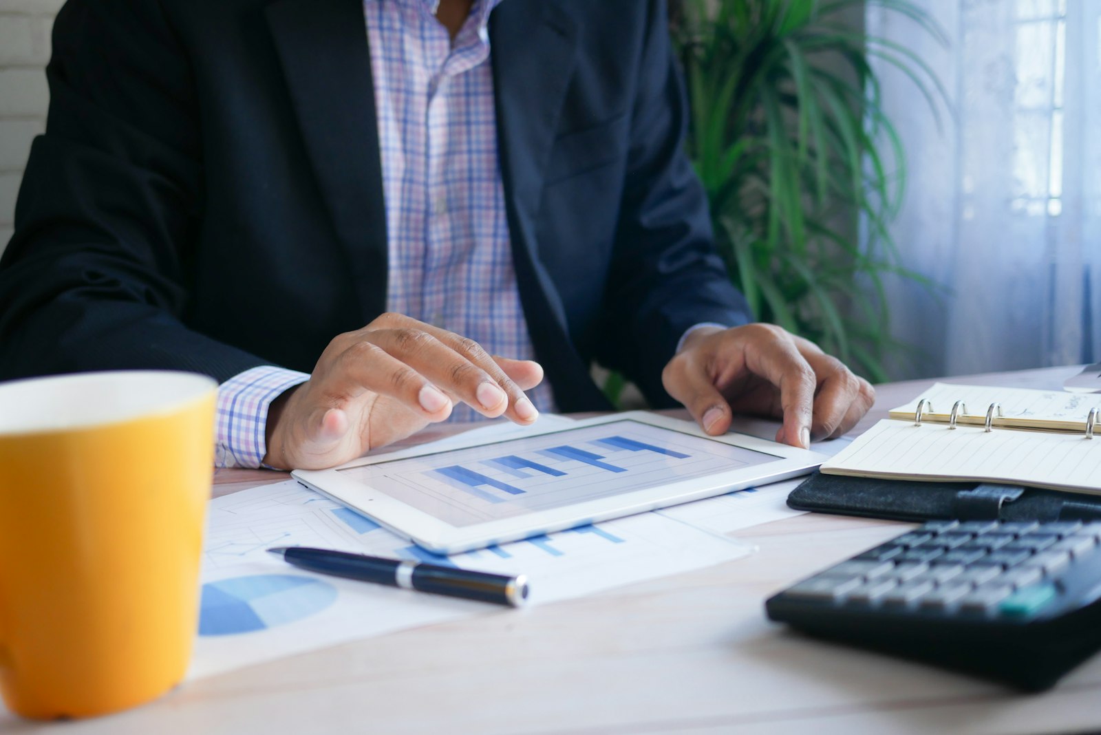 Financial consultant explaining information in her office
